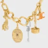 Celine Charms Triomphe in Enamel and Brass with Gold Finish Celine Charms Triomphe in Enamel and Brass with Gold Finish