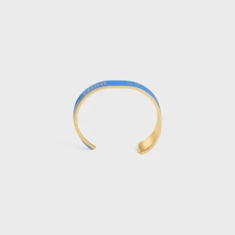 Celine Ribbon Small Cuff in Enamel and Brass with Gold Finish Celine Ribbon Small Cuff in Enamel and Brass with Gold Finish