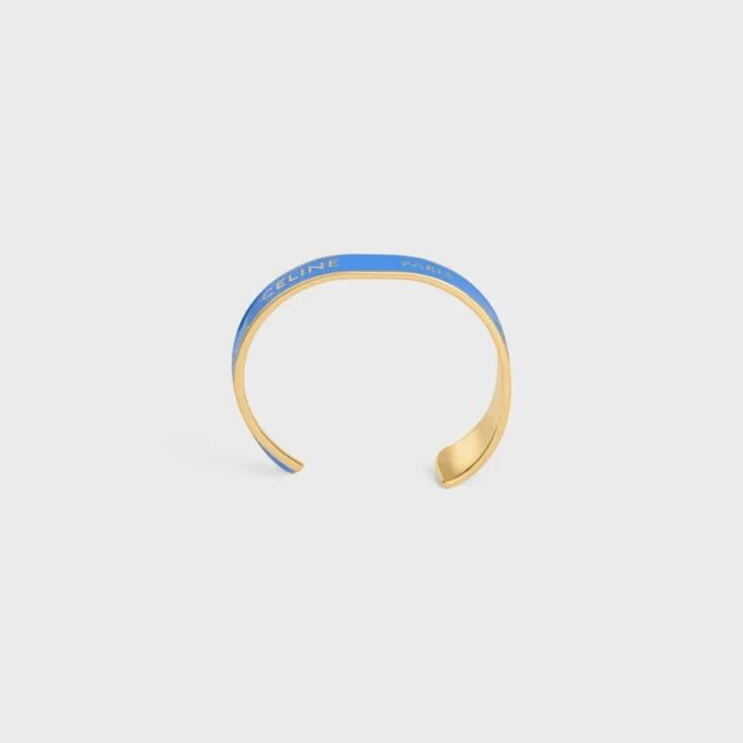 Celine Ribbon Small Cuff in Enamel and Brass with Gold Finish Celine Ribbon Small Cuff in Enamel and Brass with Gold Finish