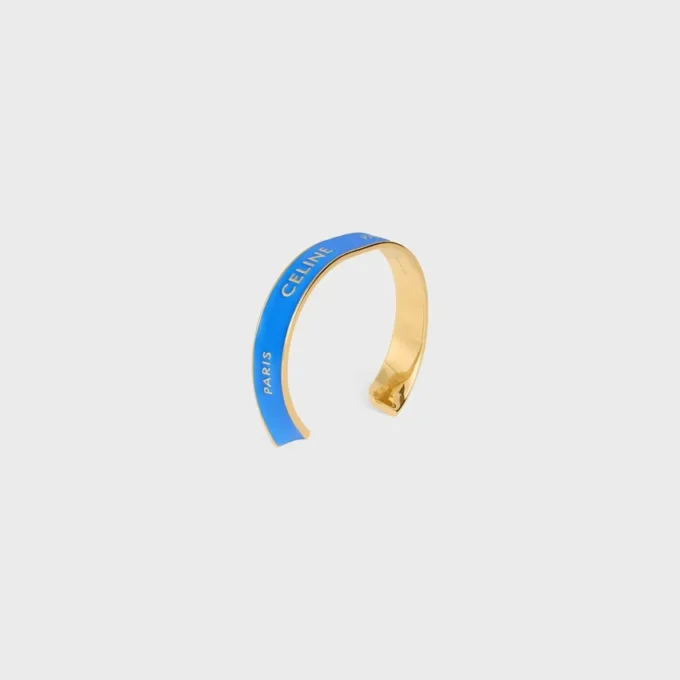 Celine Ribbon Small Cuff in Enamel and Brass with Gold Finish Celine Ribbon Small Cuff in Enamel and Brass with Gold Finish