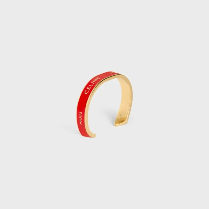 Celine Ribbon Small Cuff in Enamel and Brass with Gold Finish Celine Ribbon Small Cuff in Enamel and Brass with Gold Finish