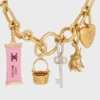 Charms Candy Bar in Enamel and Brass with Gold Finish Charms Candy Bar in Enamel and Brass with Gold Finish