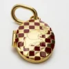 Charms Elephant Locket in Brass with Gold Finish, Enamel and Steel Charms Elephant Locket in Brass with Gold Finish, Enamel and Steel