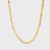 Charms Long Necklace in Brass with Gold and Rhodium Finsih Charms Long Necklace in Brass with Gold and Rhodium Finsih