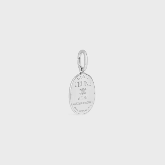 Charms Maison Celine Medal in Brass with Rhodium Finish Charms Maison Celine Medal in Brass with Rhodium Finish
