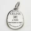 Charms Maison Celine Medal in Brass with Rhodium Finish Charms Maison Celine Medal in Brass with Rhodium Finish