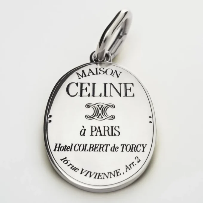 Charms Maison Celine Medal in Brass with Rhodium Finish Charms Maison Celine Medal in Brass with Rhodium Finish