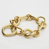 Charms Modern Thin Gourmette in Brass with Gold Finish Charms Modern Thin Gourmette in Brass with Gold Finish