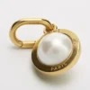 Charms Pearl in Resin Pearl and Brass with Gold Finish Charms Pearl in Resin Pearl and Brass with Gold Finish