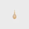 Charms Stone Egg in Botticino and Brass with Gold Finish Charms Stone Egg in Botticino and Brass with Gold Finish
