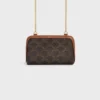 Clutch on Chain in Triomphe Canvas and Lambskin