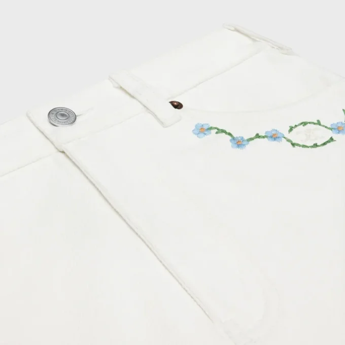 Embroidered Mini Skirt in Raw Wash White Denim