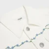 Embroidered Trucker Jacket in Raw Wash White Denim