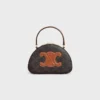 Half Moon Case in Triomphe Canvas and Calfskin