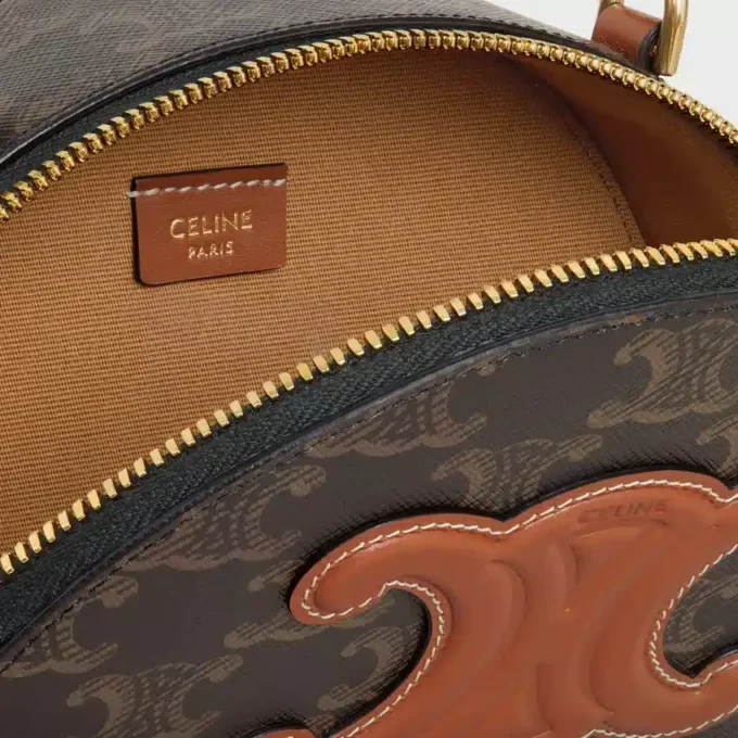 Half Moon Case in Triomphe Canvas and Calfskin