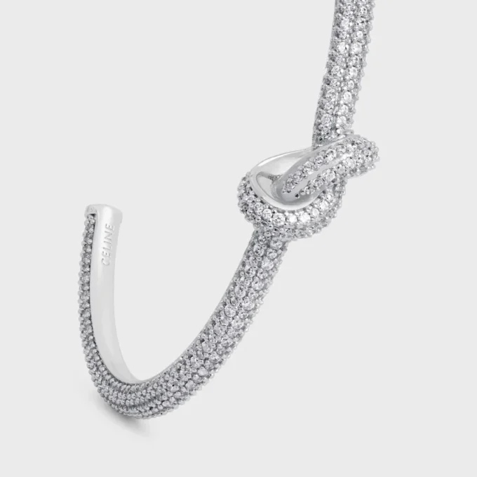 Knot Sparkle Cuff in Strass and Brass with Rhodium Finish Knot Sparkle Cuff in Strass and Brass with Rhodium Finish