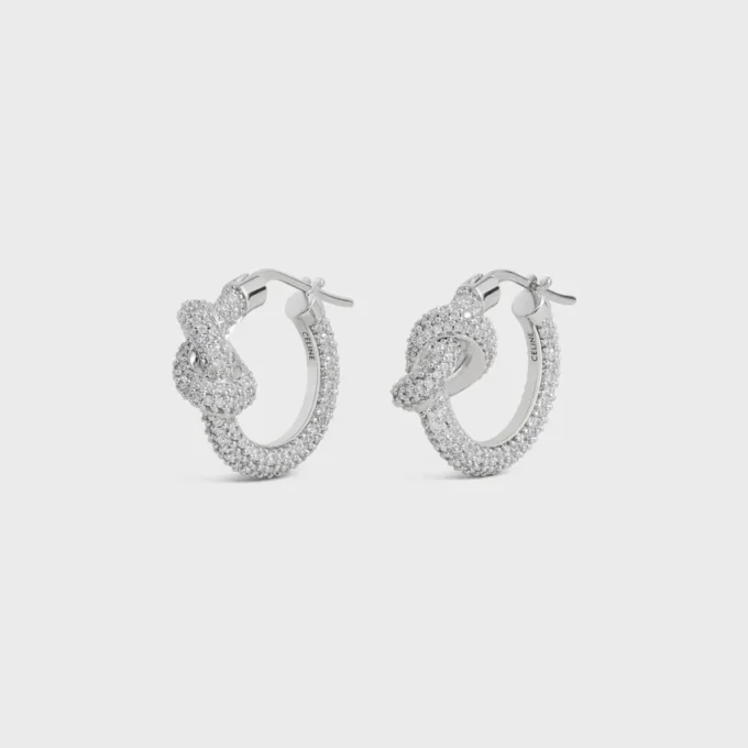 Knot Sparkle Hoops in Strass and Brass with Rhodium Finish Knot Sparkle Hoops in Strass and Brass with Rhodium Finish