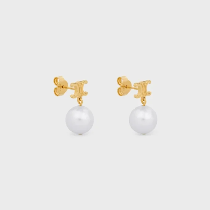 Les Perles Celine Earrings in Brass with Gold Finish and Resin Pearls Les Perles Celine Earrings in Brass with Gold Finish and Resin Pearls