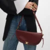 Little Halfmoon Soft Triomphe in Supple Shiny Lambskin Little Halfmoon Soft Triomphe in Supple Shiny Lambskin