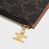 Three Pouches Set Triomphe Charms in Triomphe Canvas & Grained Calfskin Three Pouches Set Triomphe Charms in Triomphe Canvas & Grained Calfskin