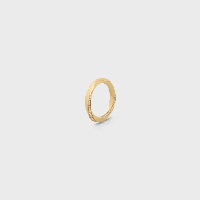 Torsion Ring in Yellow Gold and Diamonds