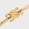 Triomphe Articulated Bracelet in Brass with Gold Finish Triomphe Articulated Bracelet in Brass with Gold Finish