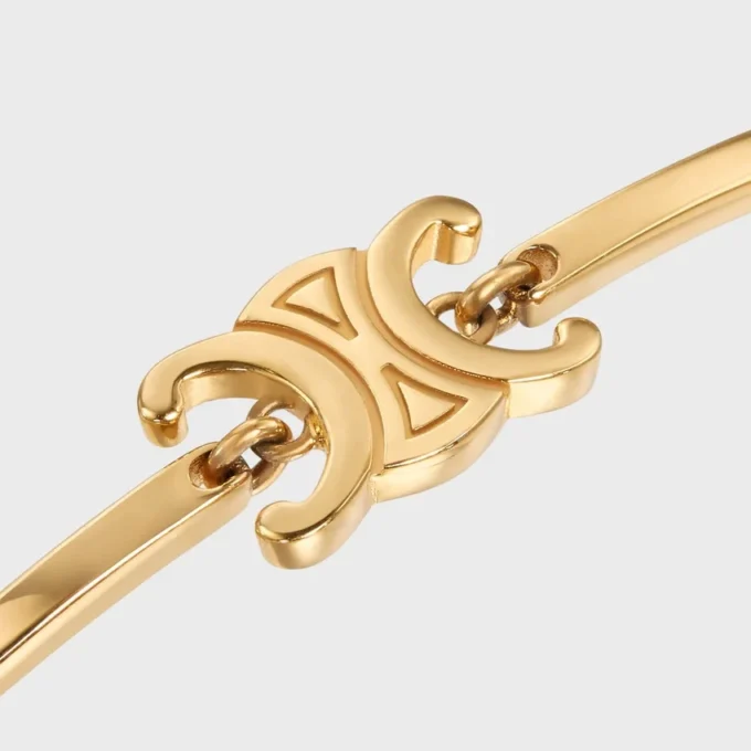 Triomphe Articulated Bracelet in Brass with Gold Finish Triomphe Articulated Bracelet in Brass with Gold Finish