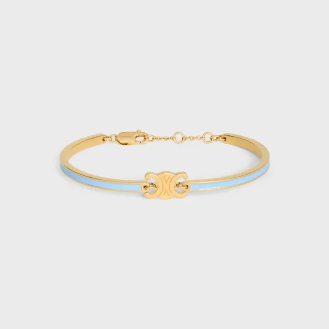 Triomphe Articulated Bracelet in Enamel and Brass with Gold Finish Triomphe Articulated Bracelet in Enamel and Brass with Gold Finish