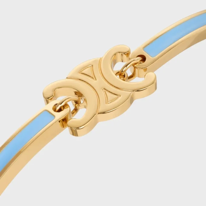 Triomphe Articulated Bracelet in Enamel and Brass with Gold Finish Triomphe Articulated Bracelet in Enamel and Brass with Gold Finish