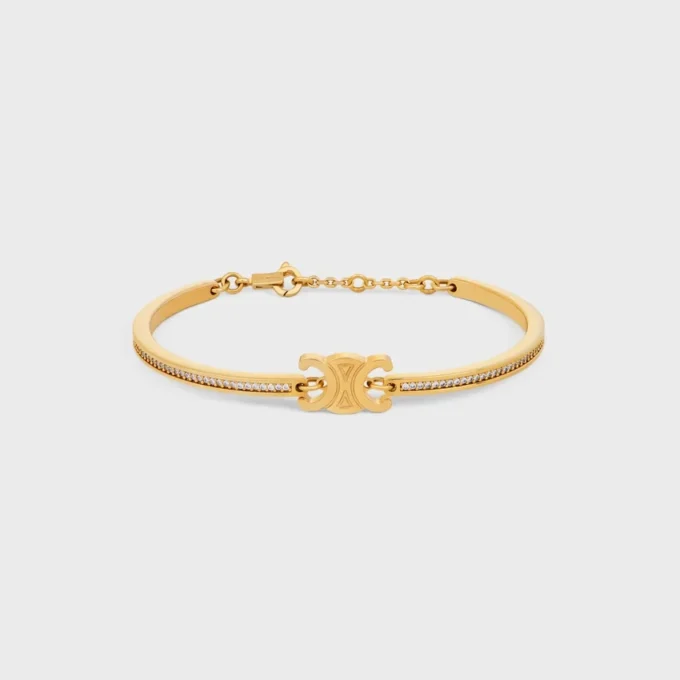 Triomphe Articulated Sparkle Bracelet in Strass and Brass with Gold Finish Triomphe Articulated Sparkle Bracelet in Strass and Brass with Gold Finish