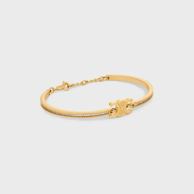 Triomphe Articulated Sparkle Bracelet in Strass and Brass with Gold Finish Triomphe Articulated Sparkle Bracelet in Strass and Brass with Gold Finish