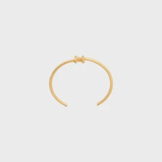Triomphe Asymmetric Cuff in Brass with Gold Finish