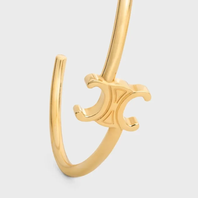 Triomphe Asymmetric Cuff in Brass with Gold Finish Triomphe Asymmetric Cuff in Brass with Gold Finish