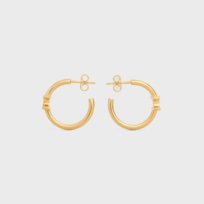 Triomphe Asymmetric Hoops in Brass with Gold Finish Triomphe Asymmetric Hoops in Brass with Gold Finish