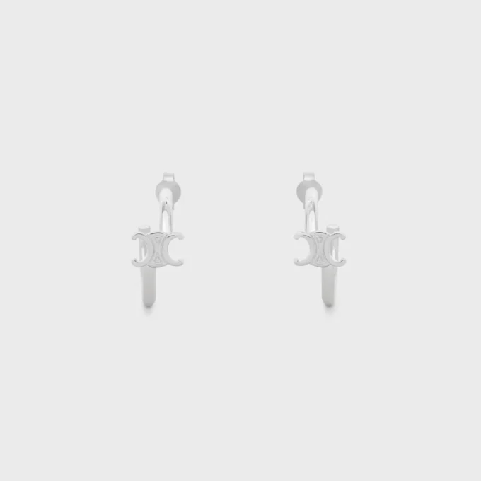Triomphe Asymmetric Hoops in Brass with Rhodium Finish Triomphe Asymmetric Hoops in Brass with Rhodium Finish