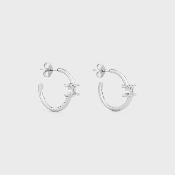 Triomphe Asymmetric Hoops in Brass with Rhodium Finish Triomphe Asymmetric Hoops in Brass with Rhodium Finish