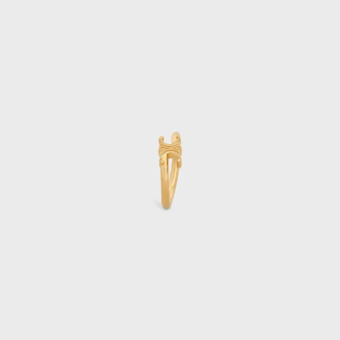 Triomphe Asymmetric Ring in Brass with Gold Finish Triomphe Asymmetric Ring in Brass with Gold Finish