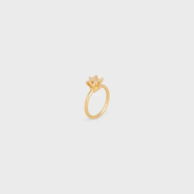 Triomphe Solitaire Sparkle Ring in Strass and Brass with Gold Finish Triomphe Solitaire Sparkle Ring in Strass and Brass with Gold Finish