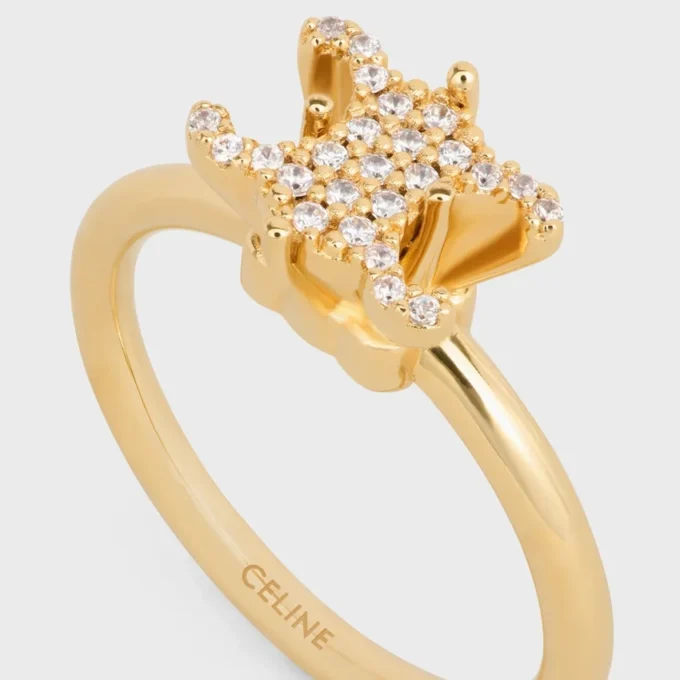 Triomphe Solitaire Sparkle Ring in Strass and Brass with Gold Finish Triomphe Solitaire Sparkle Ring in Strass and Brass with Gold Finish